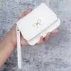 Porta-moedas de Mão Porta-cartões Feminino 2025 Novo Couro Macio com Textura de Lichia Zíper Pequena Bolsa de Moedas Bolsa de Moedas Tendência