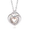 Collar del Día de la Madre con colgante de diamante de corazón hueco de mano en mano