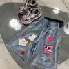 Pantalones Vaqueros Cortos de Moda para Niñas 2026 Verano Nuevos Más Vendidos con Bordado de Dibujos Animados Dopamina y Patrón de Cachorro