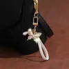 Llavero creativo estilo coreano de mariposa, colgante para coche, accesorio de regalo versátil y elegante para parejas