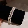 Hortelã Quatro Folhas! Pulseira de Pérolas de Camada Dupla Light Star Bay, Design de Nicho de Luxo Leve, Sensação de Alta Qualidade, Joia de Mão da Moda para Mulheres