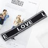 Faixa de cabeça estilo coreano Acessórios para o cabelo Stretch Trendy Men's Sports Headband Carta Headband Headband Europeu e Americano Absorvente de suor Mulheres de abas largas Grampo de cabelo