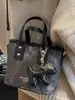 Bolsos de Nicho de Estilo Occidental de Moda 2026 Primavera Nuevo Bolso de Hombro Cruzado Vintage Bolso de Mano de Moda Bolso Cubo para Mujer