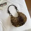 Bolso tipo dumpling esponjoso, simple y elegante, nuevo modelo otoño 2026, adecuado para el trabajo y los desplazamientos, bolso de hombro relajado y único