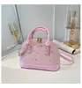 Bolsa Sencilla Retro de Concha para Comercio Exterior Nuevo Estilo 2026 Moderna para el Viaje Diario Ligera Bolso Cruzado Elegante de un Solo Hombro para Mujer