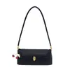 Bolso de axila texturizado casual retro para mujer 2025 nuevo de verano bolso de hombro de nicho francés bolso baguette de moda