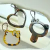 Corea del Sur alta textura amor espejo lindo gato KT ácido acético leopardo espejo de maquillaje llavero colgante de bolso DIY