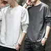 Estação da primavera e do outono, camiseta lisa popular de manga comprida, corte solto, gola redonda, camiseta masculina, top simples e versátil