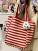 Bolsa de Lona Rayada para Mujer Otoño 2025 Nueva Tendencia Estilo Preppy Coreano Bolsa Tote con Letras Casual Gran Capacidad A39