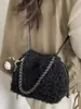 Bolsa Nueva de Mujer Otoño 2026 Bolso Cubo Moderno y Único Bolso de Hombro de Felpa Bolso Esponjoso de Color Sólido de Alto Valor