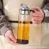 Pote de óleo de vidro de borosilicato de alta qualidade, venda direta, abertura e fechamento automáticos, grande capacidade, molho de soja, vinagre, temperos, garrafa de óleo de aço inoxidável à prova de poeira