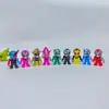 Una variedad de bloques de construcción, manos y pies, guerreros enmascarados móviles, Superman, Caballero, huevos retorcidos, saldos de comercio exterior, animación de dibujos animados