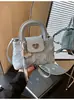 Bolsa Jeans Transfronteiriça para Mulheres Verão 2025 Nova Moda Nicho Bolsa Transversal High-End Popular Bolsa Balde Portátil