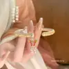Pulseira de Prata Pura 999.9 Fusheng com Padrão de Grama Tang e Borboleta para Mulheres com Esmalte Dourado Sólido Aberta Estilo Chinês Pulseira de Prata Pura