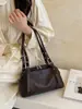 A bolsa feminina popular de grande capacidade deste ano, nova coleção de inverno 2026, bolsa tote casual vintage para ombro, moda