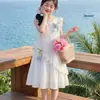Vestido de niña verano 2026 nuevo modelo vestido de verano para niños hermoso vestido blanco de princesa para niña pequeña ropa de verano para niños