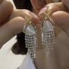 Brincos de Tassel de Diamante Completo de Pedra de Olho de Gato Brincos Femininos de Luxo de Alta Qualidade 2023 Novos Brincos de Design de Nicho Explosivo
