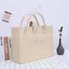 Bolso de Mano de Gato de Fieltro Nuevo Lindo Oso de Dibujos Animados Simple Color Sólido Bolsa de Compras Gran Capacidad Bolso Tote Portátil