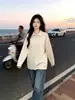 Camiseta versátil de manga larga para mujer, estilo americano moderno de otoño de alta gama, con cuello de polo, top casual holgado