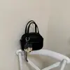 Bolsa de mão texturizada de alta qualidade para mulheres, nova bolsa de ombro da moda 2026 com padrão de lichia, bolsa transversal pequena quadrada