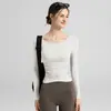 Roupa de ioga feminina 2024 outono e inverno nova com bojo manga comprida slim esportiva para corrida top fitness feminino atacado