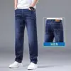 Comercio exterior primavera y otoño jeans para hombre, pantalones elásticos rectos holgados, pantalones largos casuales de moda para hombre, nuevo estilo de negocios