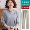 Elegante capa base de otoño para mujer, elegante y sofisticada, moderno suéter fino de punto con cintas fluidas, adecuado para mujeres de mediana edad y mayores