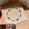 Bestseller de Xiaohongshu Pulsera Redonda de Circonita Verde Diseño de Nicho Pulsera Sencilla Lujo Ligero Sensación de Alta Gama Joyería de Mano para Mujeres