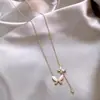 Collar de mariposa ojo de gato de circón bañado en oro real de 18k, cadena para la clavícula de lujo ligero de alta gama, joyería de moda y simple