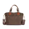 Bolsa transversal de grande capacidade para ir ao trabalho, bolsa tote casual feminina nova e moderna 2026, bolsa de mão em tecido de nylon