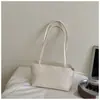 Bolso de mano de moda estilo coreano, nuevo modelo principios de otoño 2026, bolso de axila de alto valor, simple y de nicho, bolso tote pequeño de color sólido de moda