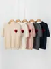 Tricô de manga curta 100% cashmere puro para mulheres, gola redonda, com bordado em forma de coração, caimento solto, suéter versátil, novo estilo 2026