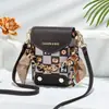 Bolsas de Mujer Transfronterizas 2026 Modelo Nuevo Gran Capacidad Bolsa para Teléfono Venta al por Mayor Compartimento Doble Gama Alta Vertical Simple Bolso Cruzado