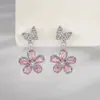 Venta Caliente Aretes Pequeños Frescos y Dulces de Zirconia Rosa Flor de Mariposa Lujo Ligero Gama Alta Versátiles de Temperamento Venta al por Mayor