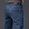 Calça jeans masculina da cidade de Xintang, Guangzhou, estilo fino de verão, novo modelo 2026, corte reto solto, calça comprida de alta qualidade para homens, primavera e outono