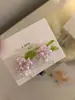 Pendientes de flor de cristal pequeños y frescos con cuentas para mujer, diseño dulce y lindo, pendientes Joker, novedad 2025