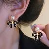 Pendientes de lazo de perla, elegantes y de moda, de alta gama, de estilo socialité, 2023. Nueva moda para mujer.