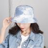 Nuevo sombrero de pescador teñido anudado de doble cara, sombrero de ala ancha con protector solar de moda europea y americana, sombrero de lavabo de viaje para parejas de primavera y verano.