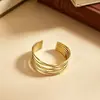 Pulsera metálica galvanizada con corte cruzado de línea y raya, muñequera simple y única de moda, joyería de nicho de alta gama