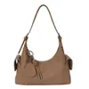 Bolso de hombro casual minimalista estilo francés de cuero suave con diseño de bolsillo lateral, moderno y versátil para el uso diario