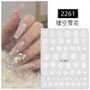 Arte de Uñas 2026 Más Vendido Navidad Lindo Dibujo Animado Calcomanías de Copo de Nieve Hueco Estilo Ins Estrella Lámina de Oro Decoraciones para Uñas