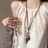 Estilo Étnico Nuevo Estilo Chino Disco de Bronce Apilado Collar Cadena Larga para Suéter Estilo Bohemio Accesorios de Top