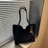 Bolso de gran capacidad transfronterizo, estilo relajado, para mujer, nuevo bolso tote retro para el día a día 2026, bolso de hombro simple y versátil