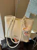 Bolso tipo cubo con patrón tejido de moda, bolso cruzado único y moderno, estilo coreano, elegante para el trabajo y los desplazamientos, bolso de mano casual