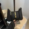 Bolso de diseñador de nicho estilo coreano para mujer, nuevo modelo primavera-verano 2026, bolso de mano texturizado, bolso de hombro versátil y moderno