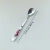 Cuchara y tenedor florales de fruta con mango de cerámica creativa, cuchara de postre de acero inoxidable 410, cuchara para remover café, cuchara y tenedor para el té de la tarde