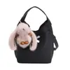 Elegante y versátil bolso tote tipo cubo, nueva colección otoño 2026, con un diseño único y cierre metálico, perfecto para el día a día y se puede llevar como bolso cruzado.
