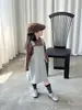 Nova Roupa Infantil Estilo Coreano Outono 2026: Vestido Estiloso de Suspensório para Meninas, Vestido Longo de Manga Longa Slim-Fit com Estampa de Leopardo