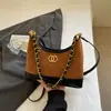 2025 Novo Estilo Pequena Corrente Rombo Dourada Bolsa Feminina Moda Costura Bolsa de Ombro Textura Estilo Ocidental Bolsa Transversal Tendência Feminina