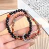 Pulsera de tinta de humo seis nuevas pulseras de cuentas agrietadas de hielo chinas pulsera de anillo de correr de nicho de alta gama de moda para hombre